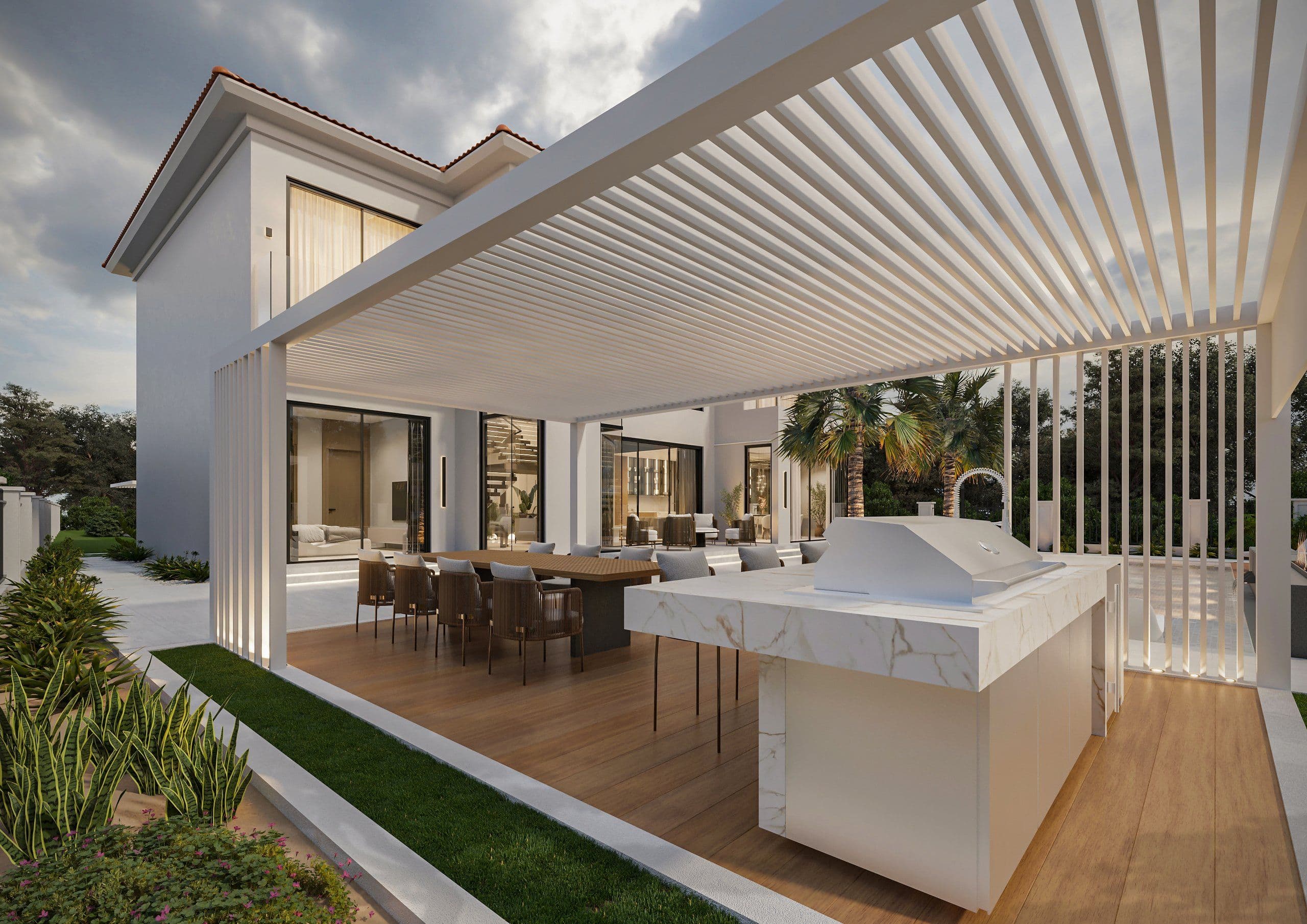 Covered outdoor kitchen with a marble island, a dining table and a slatted roof